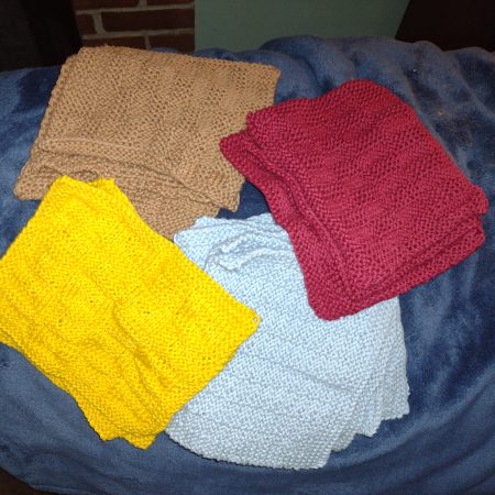 Cloud, Cocoa, Daffodil, and Merlot washcloths together